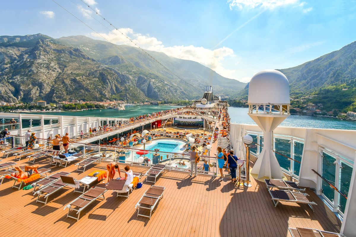 Tourists on a large cruise ship on Boka Bay near Perast Montenegro.