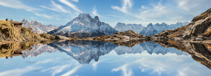 Reflection of Mont Blanc on lake in high mountains in the French Alps,