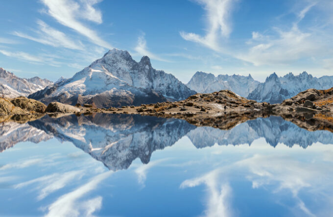Reflection of Mont Blanc on lake in high mountains in the French Alps,
