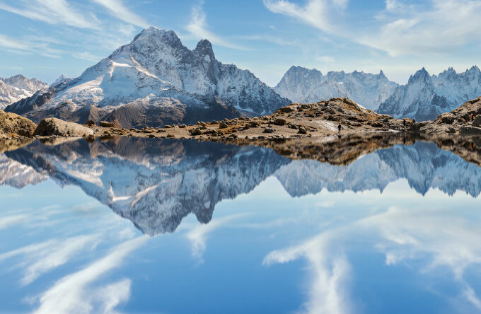 Reflection of Mont Blanc on lake in high mountains in the French Alps,