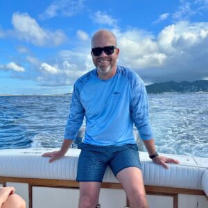 Clint on a boat