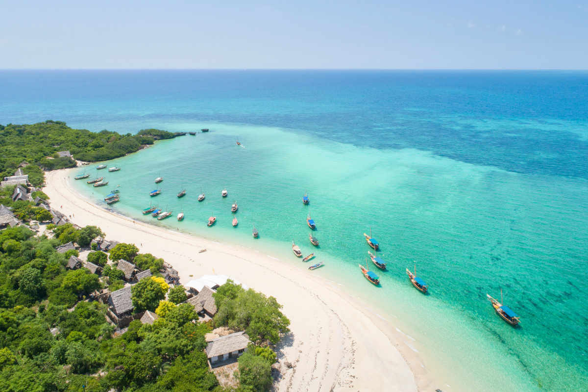 beautiful beach with boats on Zanzibar island