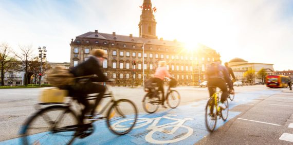Travelers bike on Copenhagen street bike lane