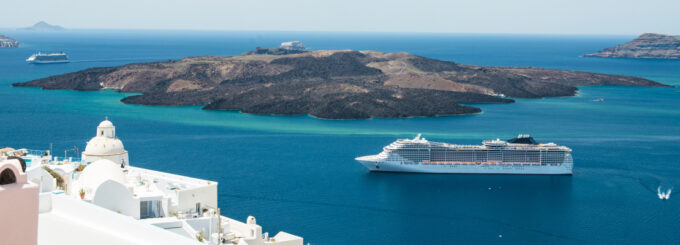 Luxury cruiser in Fira Bay