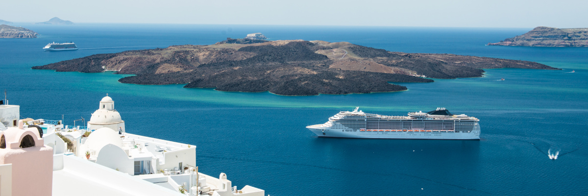 Luxury cruiser in Fira Bay