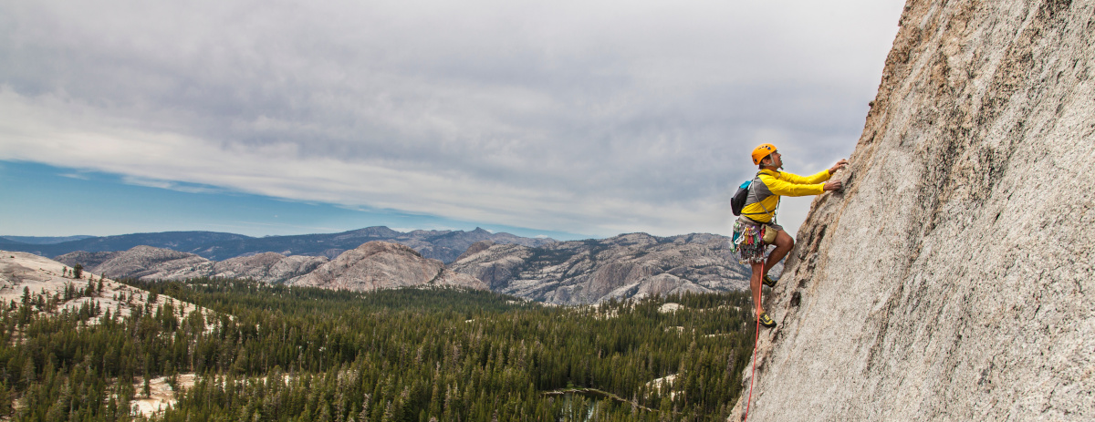 Climbing a challenging mountain.