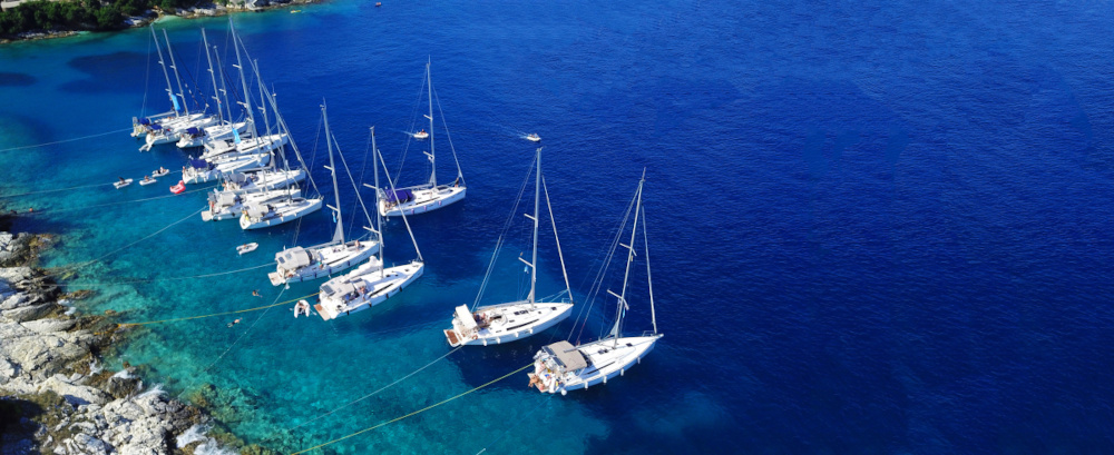 sail boats docked in paradise bay of Fiskardo, Kefalonia island, Ionian, Greece