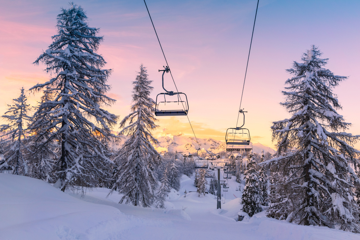 Winter mountains panorama with ski slopes and ski lifts